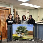 Four seniors from the National Art Honor Society painted a cedar tree on a large canvas for the Student Center (click to read more).