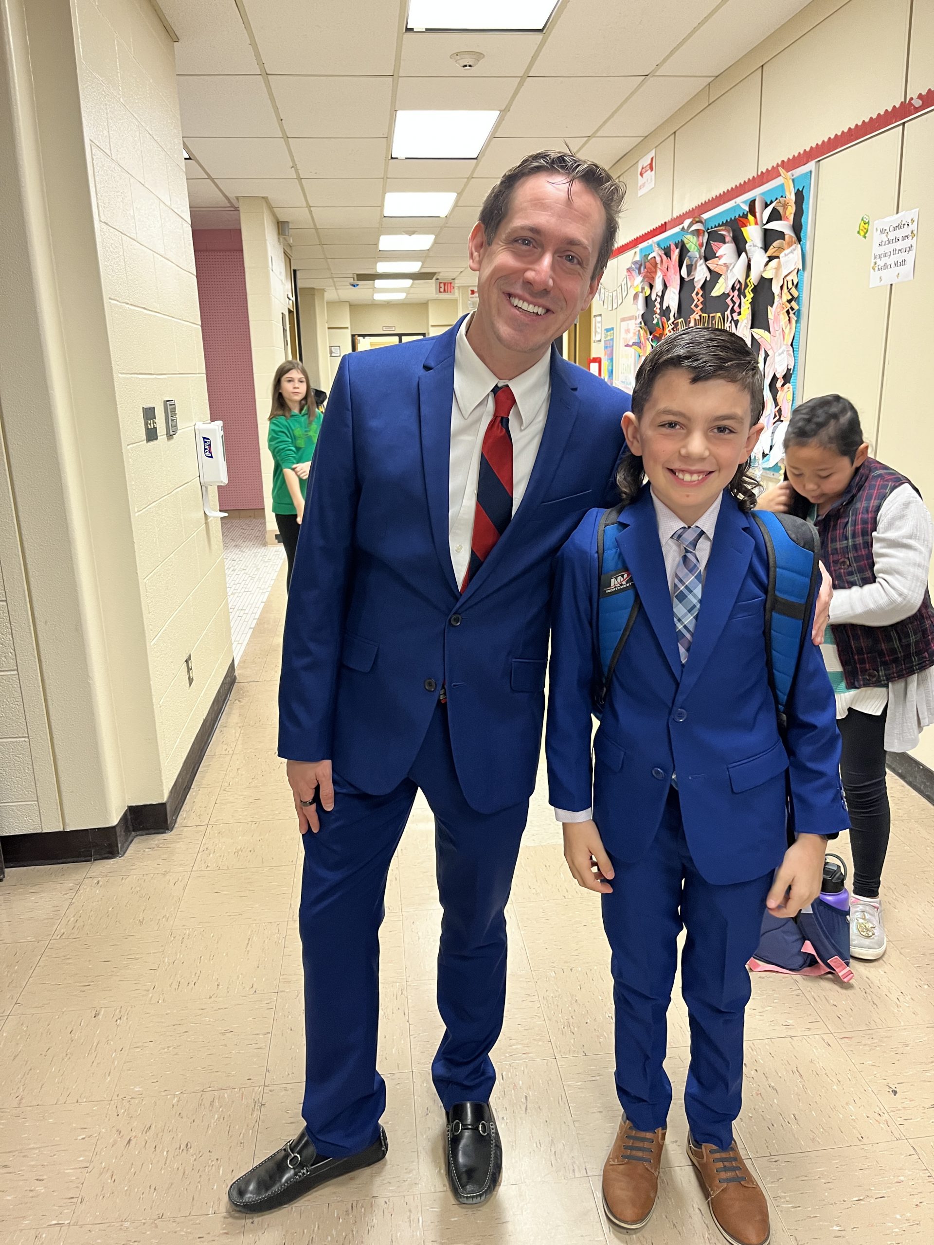 Okte 4th grade teacher Mr. Carter twinning with his student, Jack. The Okte 4th graders spent the day at the NYS Capitol for a field trip and dressed for the occasion!
