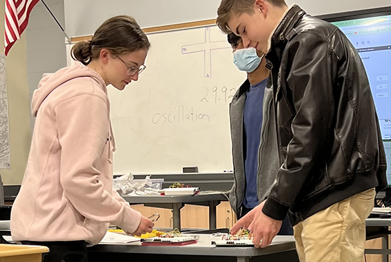 Students in Digital Electronics build 555 timer circuits using MYDAQ Digital Protoboards. 