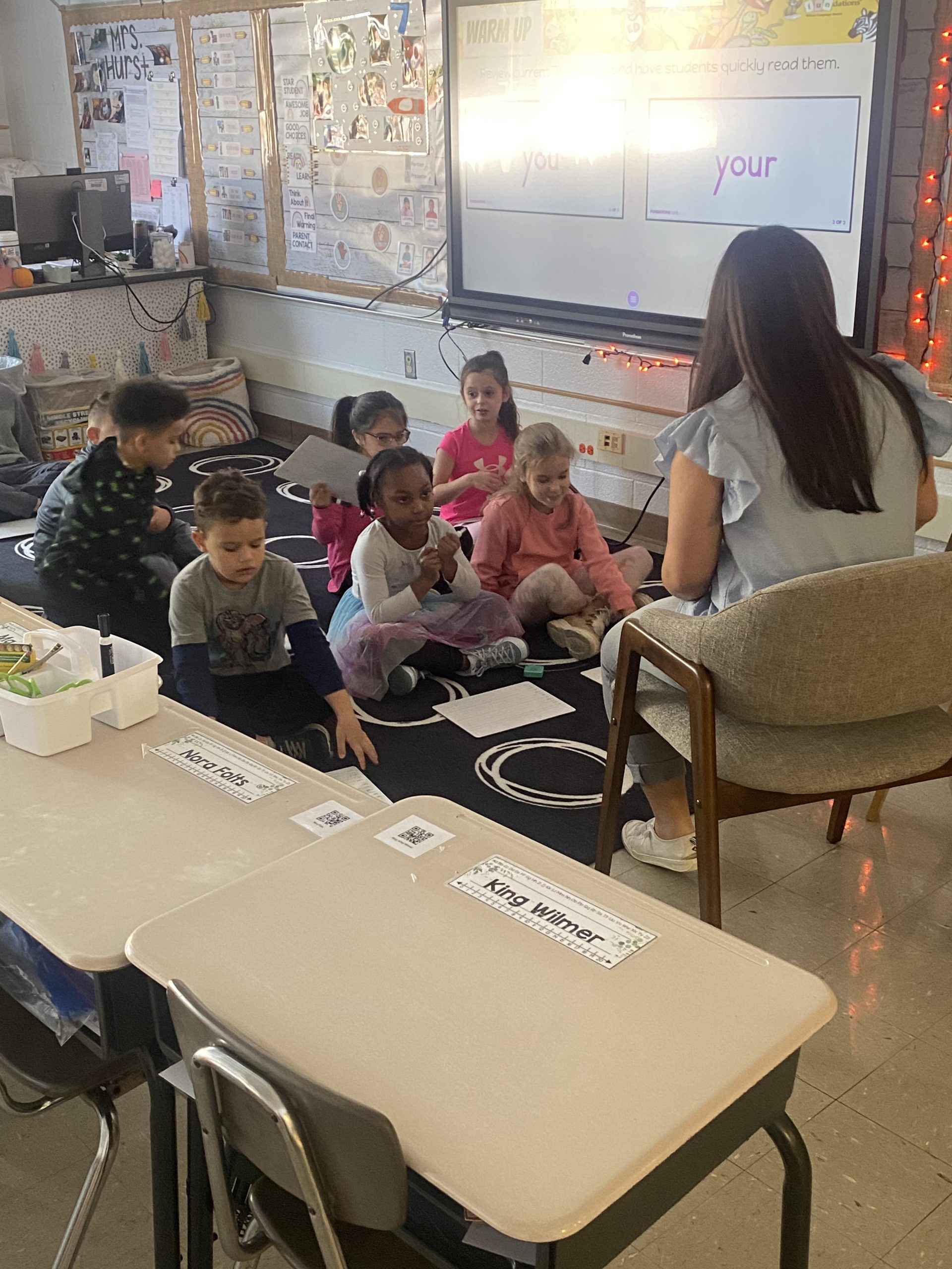 Emily Hurst's first grade class at Karigon uses white marker boards to complete the “glued sounds” exercise,students sound out and spell “trick words,” allowing for independent learning.