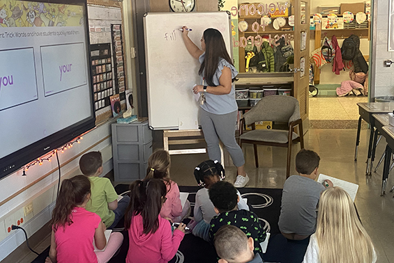 Emily Hurst's first grade class at Karigon uses white marker boards to complete the “glued sounds” exercise,students sound out and spell “trick words,” allowing for independent learning.