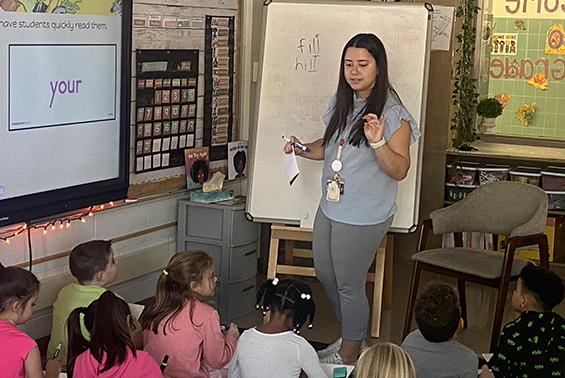 Emily Hurst's first grade class at Karigon uses white marker boards to complete the “glued sounds” exercise,students sound out and spell “trick words,” allowing for independent learning.