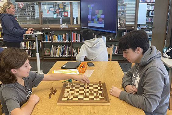 Students enjoy activities at HSW library, including AI word association, chess, World Cup geography and homework help.