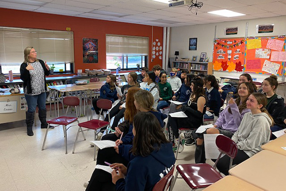 Acadia students in Mrs. Evans' English 8H class engage in a virtual book talk with Gr. 8 students from De Pere Middle School in DePere, WI. 