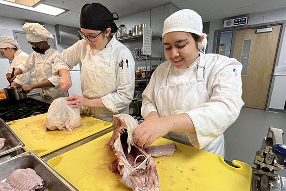Shen High School student Jade O’Campo was guilty of ‘fowl’ play Monday as she prepared turkeys in the Culinary Arts and Hospitality Tech lab of the Capital Region BOCES Career & Technical Education Center