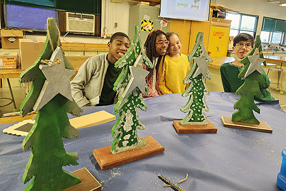 Mr. Symonds's ISD and FSD students ( Functional Skills Development and Individual Skills Development) made whimsical trees for the holiday.