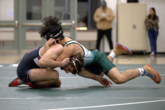 Two students wrestling