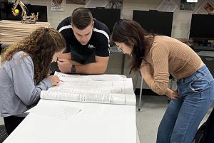 Students in Mr. Dillman's Architecture class engage in a Blue Print Scavenger Hunt.