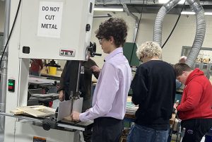 Shen High School students in Intro to Technology are building "to scale" model sheds.