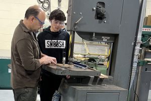 Shen High School students in Intro to Technology are building "to scale" model sheds.
