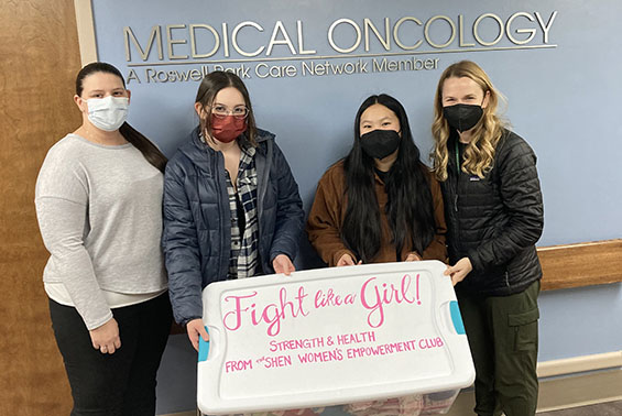 Members of the high school's Women's Empowerment Club delivered a box of goods to the Ellis Hospital Radiation and Oncology Center. 