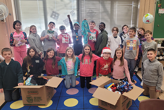 Chango 5th graders in Mrs. Pipino's class wrote persuasive letters and collected 87 pairs of pajamas for the annual Scholastic Pajama Drive (partnered with the Pajama Program).