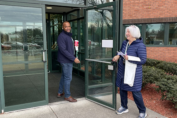 Superintendent Dr. L. Oliver Robinson and members of the leadership team enter 5 Maxwell Drive for the first time as the district takes over ownership.