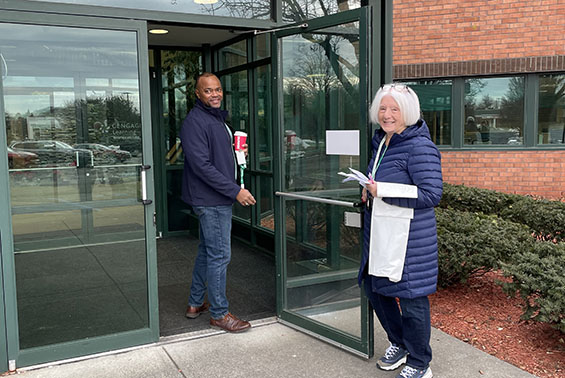 Superintendent Dr. L. Oliver Robinson and members of the leadership team enter 5 Maxwell Drive for the first time as the district takes over ownership.