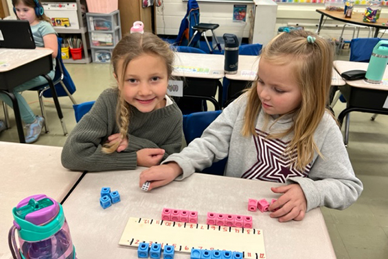 Skano first graders play math games to learn addition facts.
