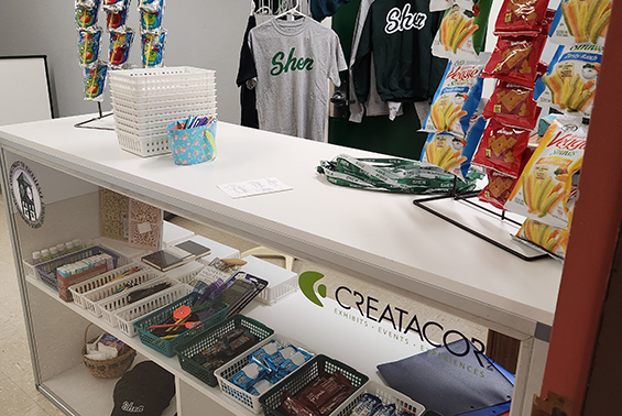 Creatacor Exhibits & Displays, Inc. donated a new cabinet to the HSE School Store