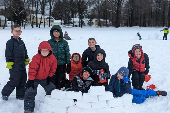 Skano students have fun playing in the snow at recess.