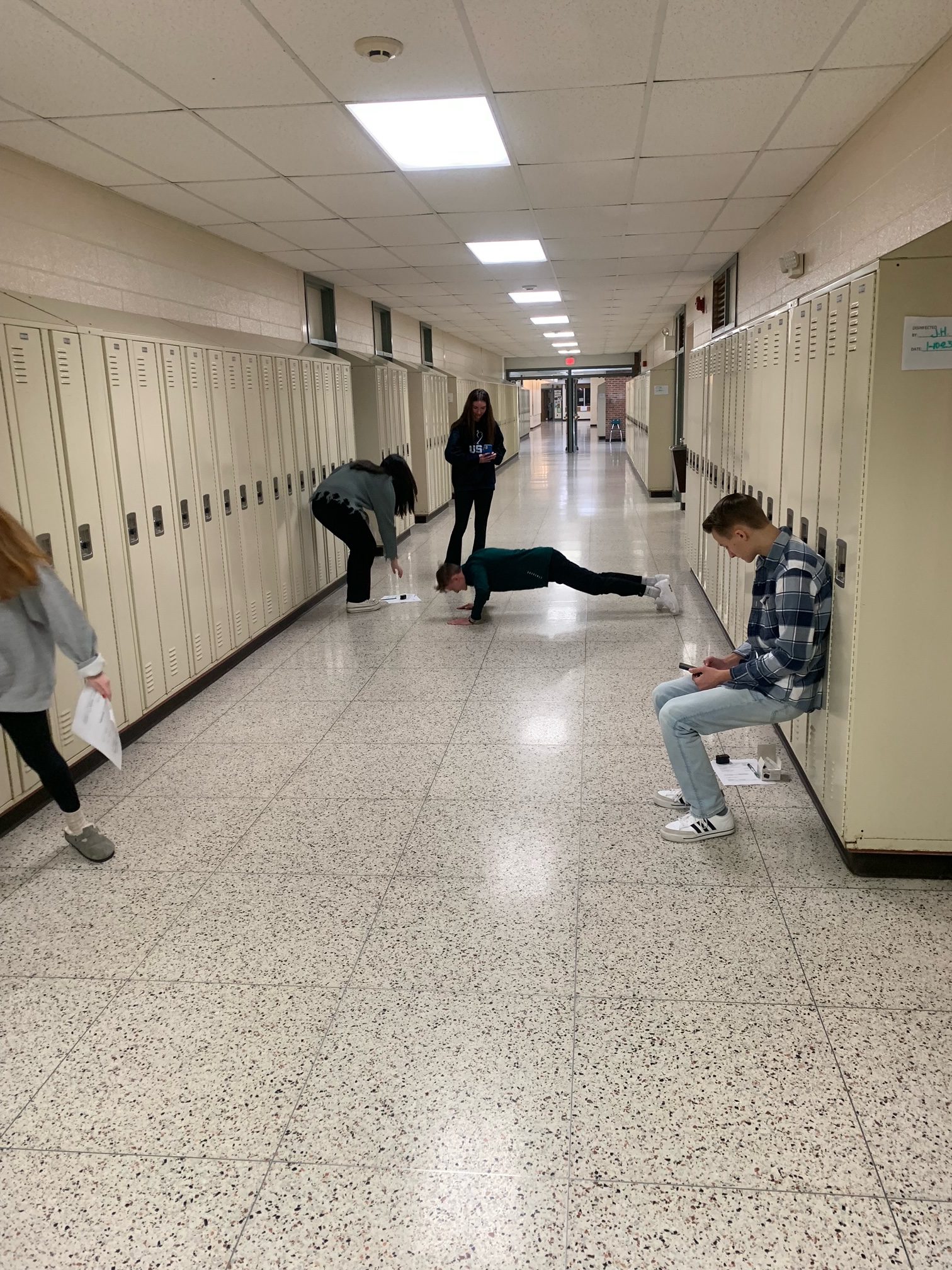 High school students in the Health Sciences for Medical Careers course practice career skills with oximeters,  sphygmomanometers, and stethoscopes.
