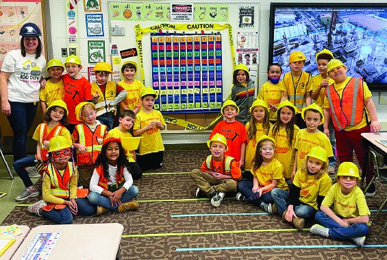 Kids in construction gear.