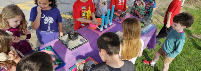 Chango elementary students learning all about science on the Physics Bus!